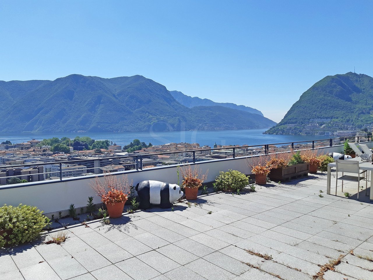 Lugano - Attico 5,5 locali con roof garden vista lago