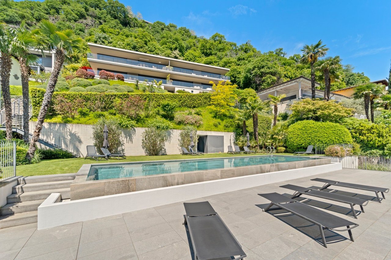 Splendido appartamento di 3,5 locali con vista lago giardino e piscina